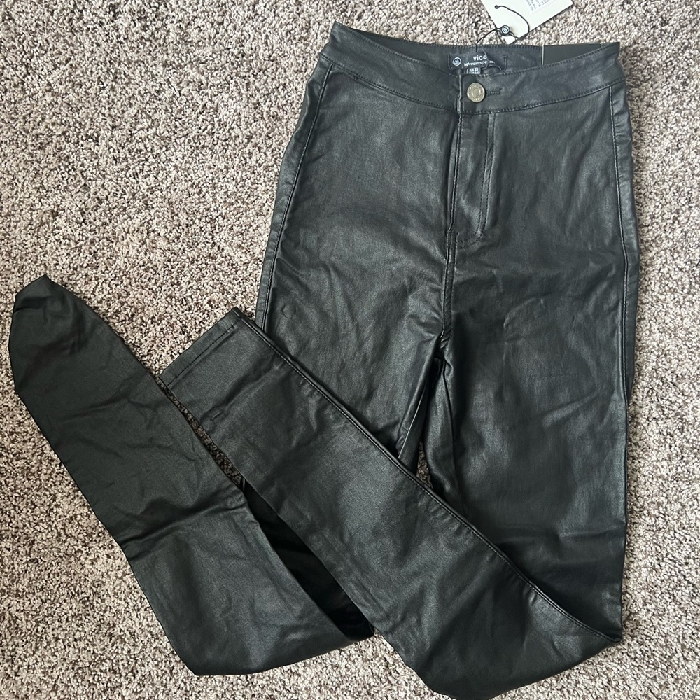High waisted black shiny pants
